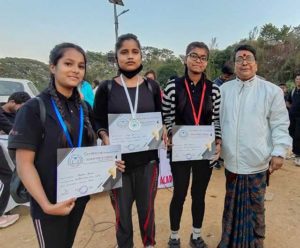 HS 1st year girls Asha, Mamoni nd Puja Das are seen with their winning medals of 200 mtr race